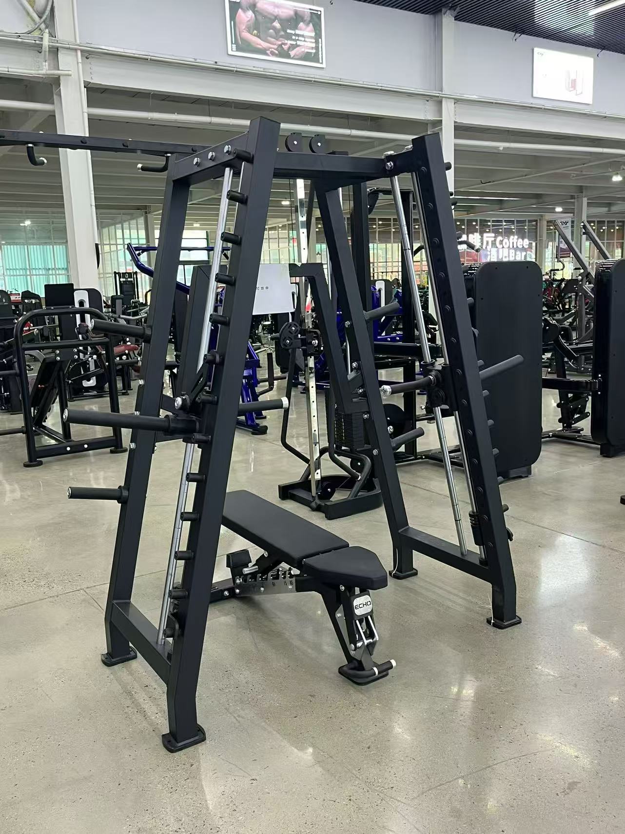 Actual showroom photograph of a black multi-functional training machine